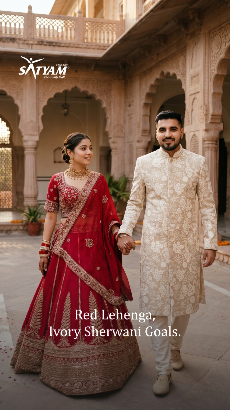 Look royal in Wedding Couple Outfit!
.
Choosing bride and groom outfits separately often leads to clashing tones. 
.
This set keeps both looks aligned, pairing a cream floral-embroidered sherwani, safa and stole with a red lehenga in gold fern-motif borders. 
.
Both outfits suit the same function and the same set of wedding photographs.
.
Is this Red Gold Couple Set your pick?
.
.
.
📍Juni Shukrawari Road, Opp. Bank of India, Sakkardara, Nagpur.
📞 85300 26682
.
[Couple wedding outfit, Ethnic couple look, wedding, Indo western couple outfit, Wedding Lehenga, Sangeet Look, Couple Ethnic Wear, Couple outfit, Ethnic wear, Festive couple outfit ideas, Designer ethnic wear, Couple Fashion, Couple Outfit Goals]

#satyammall #coupleogals #weddingfashion #fashion #explore